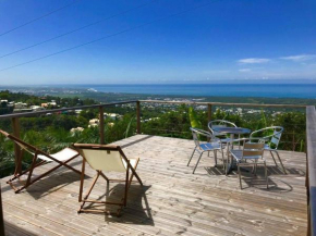 Lounge des hauts 3 maisons à L'étang-Salé sans vis à vis avec vue panoramique Océan et Montagne